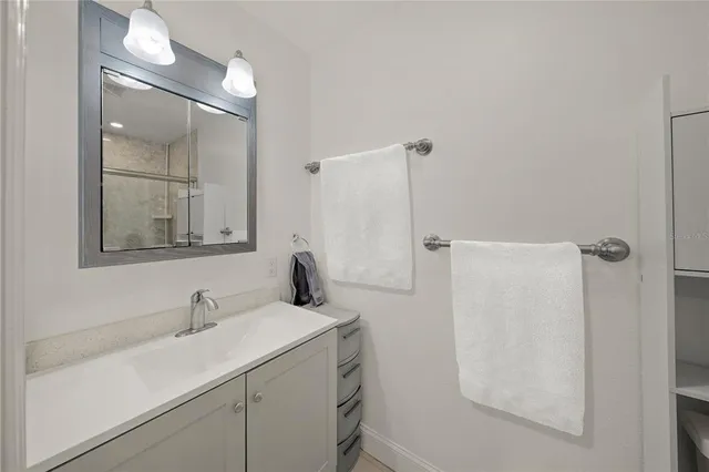 a building outdoor space with patio furniture and potted plants