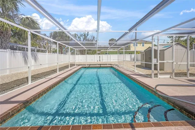 a view of a lake with a yard