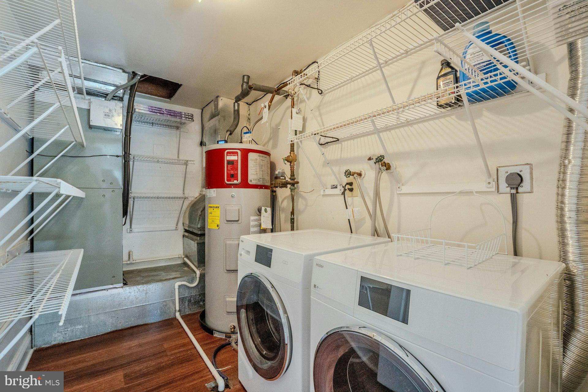 11310 Harborside Cluster Reston, VA 20191 - Photo 40 of 71 Efficient laundry space with storage.