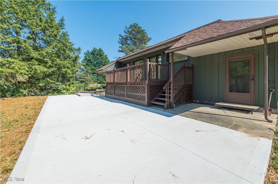 433 Chestnut Road Independence, OH 44131 - Photo 44 of 50 View of patio with a wooden deck