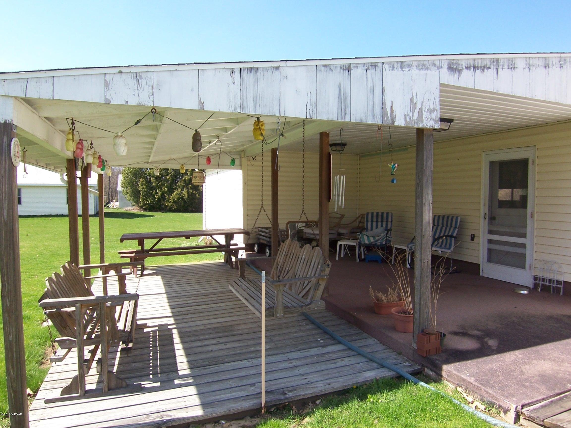 198 Pike Road Howard, PA 16841 - Photo 19 of 31 Covered patio and deck