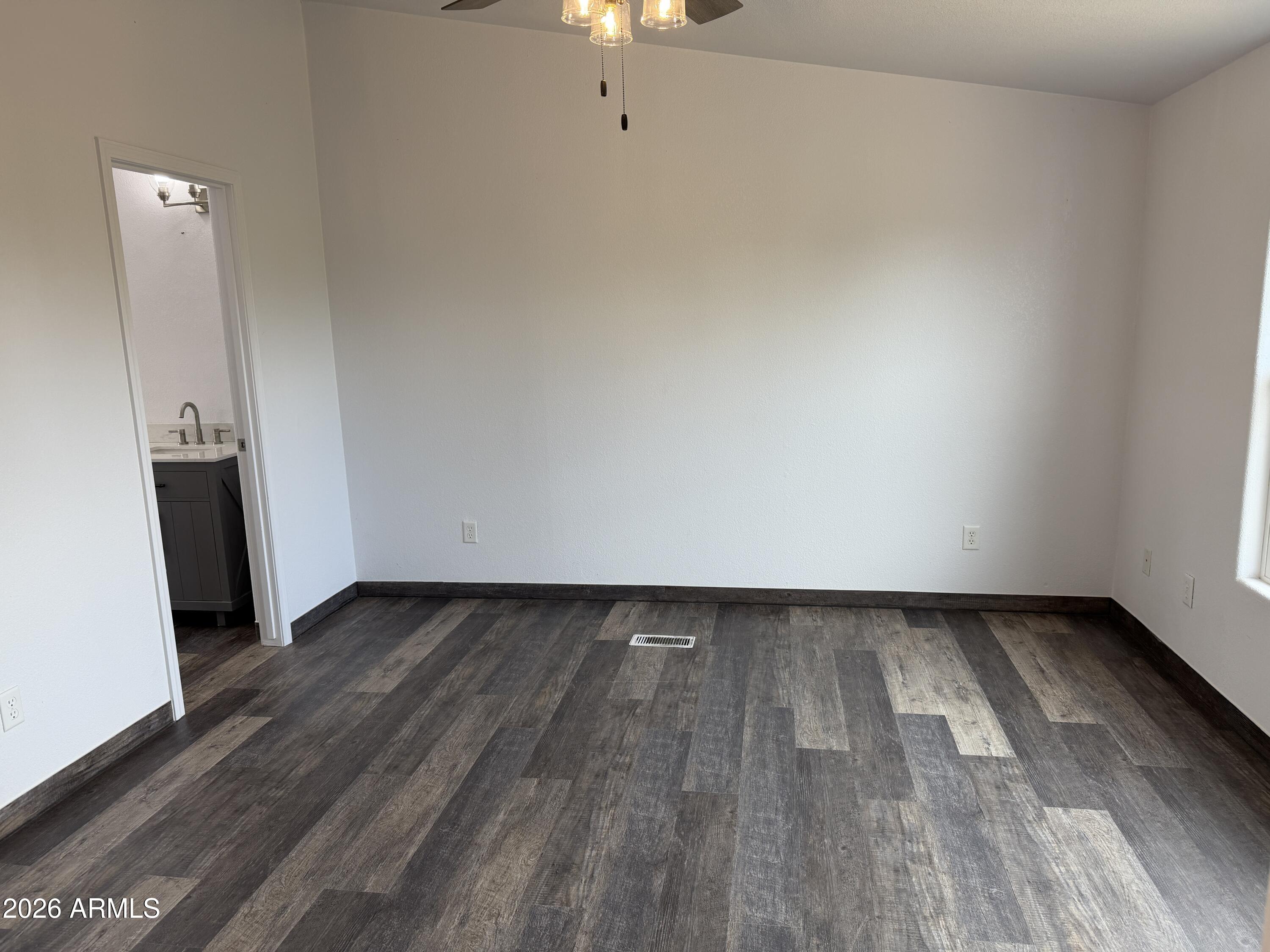 928 West Austin Street Bisbee, AZ 85603 - Photo 11 of 27 a view of an empty room and wooden floor