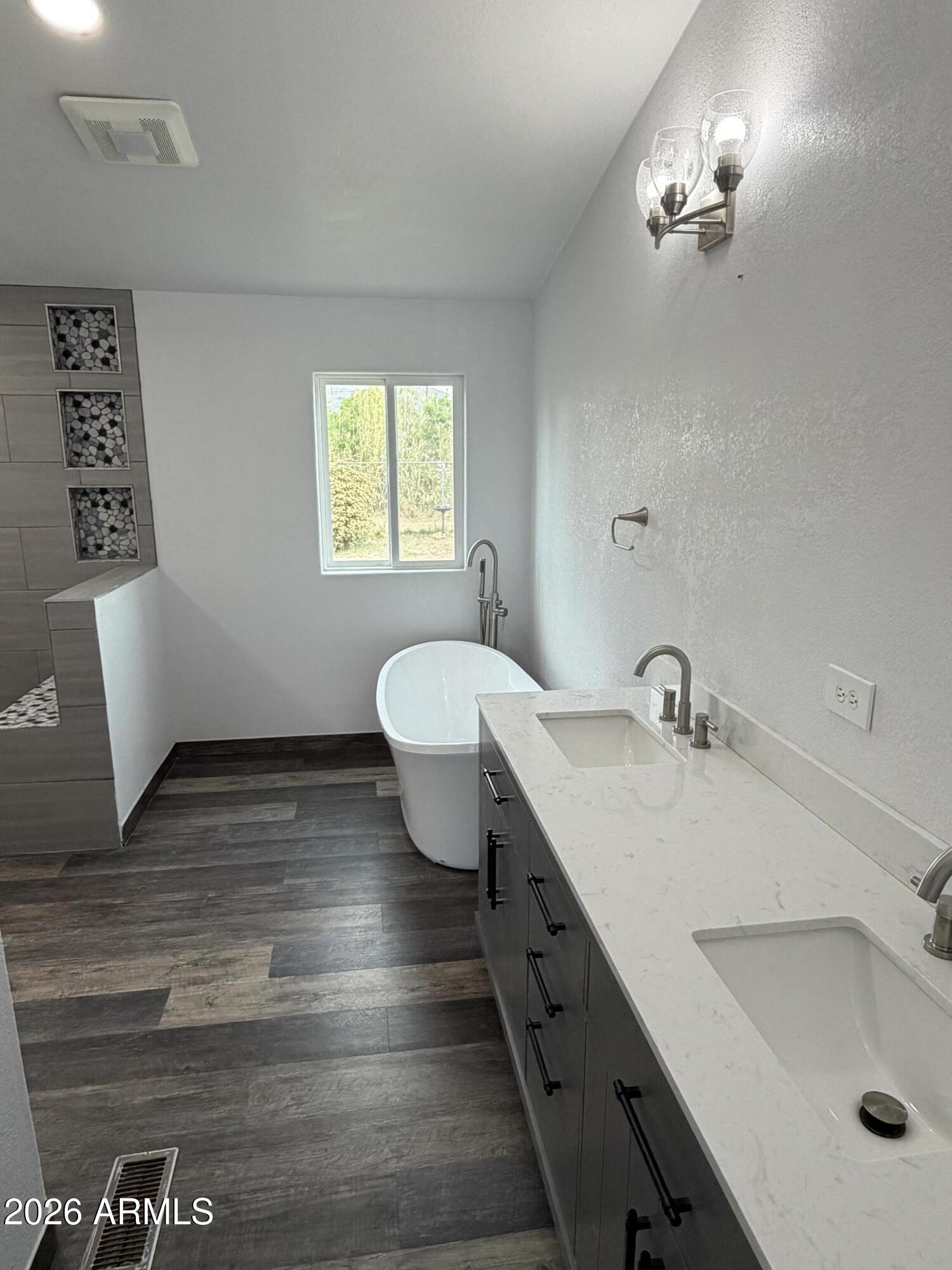 928 West Austin Street Bisbee, AZ 85603 - Photo 13 of 27 a bathroom with a sink and a mirror