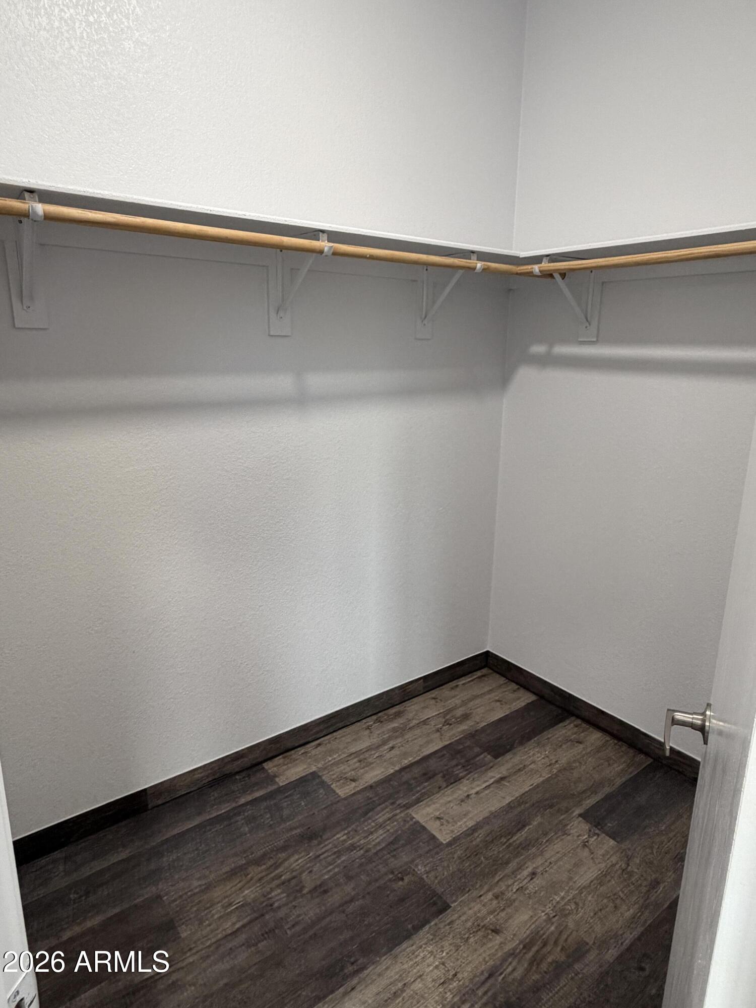 928 West Austin Street Bisbee, AZ 85603 - Photo 16 of 27 a view of a closet with wooden floor