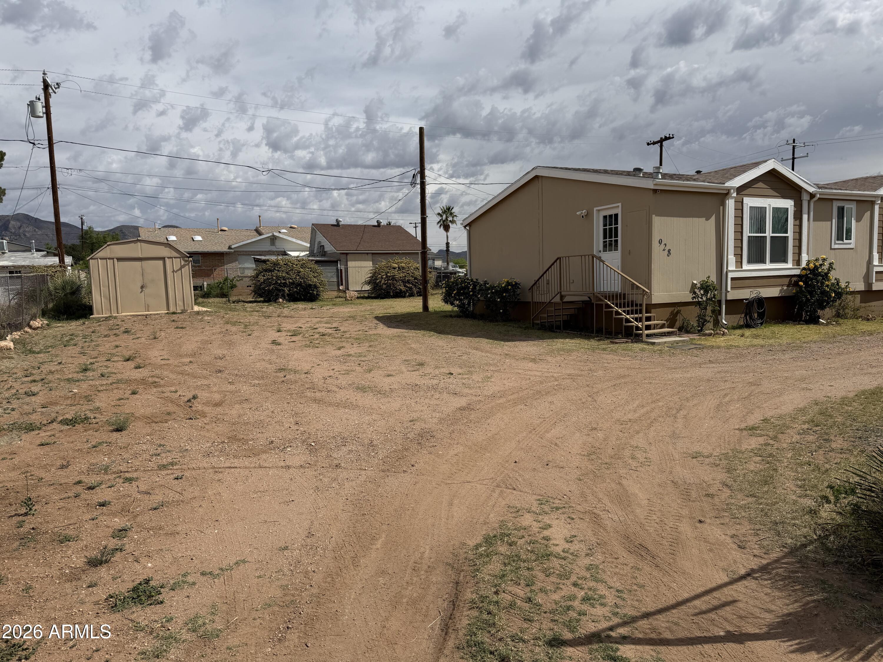 928 West Austin Street Bisbee, AZ 85603 - Photo 26 of 27 a view of a house with backyard