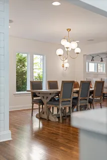 a view of a patio with swimming pool table and chairs