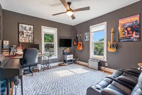 a view of a livingroom with furniture and window