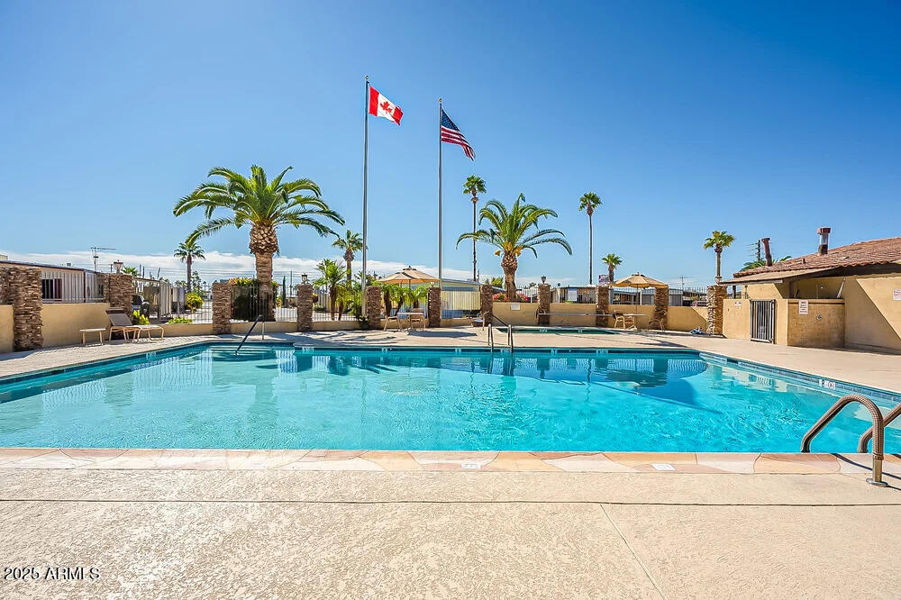 10220 East Apache Trail, Unit 16 Apache Junction, AZ 85120 - Photo 38 of 49 a view of a terrace with outdoor seating