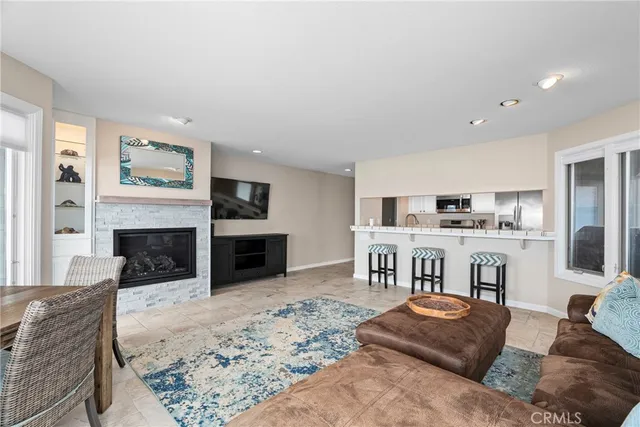 a view of a dining room with furniture and window