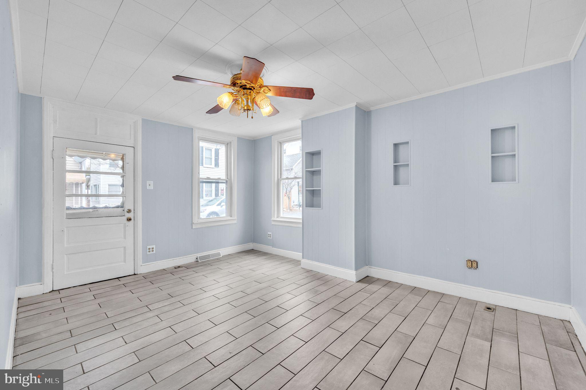 48 Elizabeth Street Hagerstown, MD 21740 - Photo 25 of 48 wooden floor in an empty room with a window
