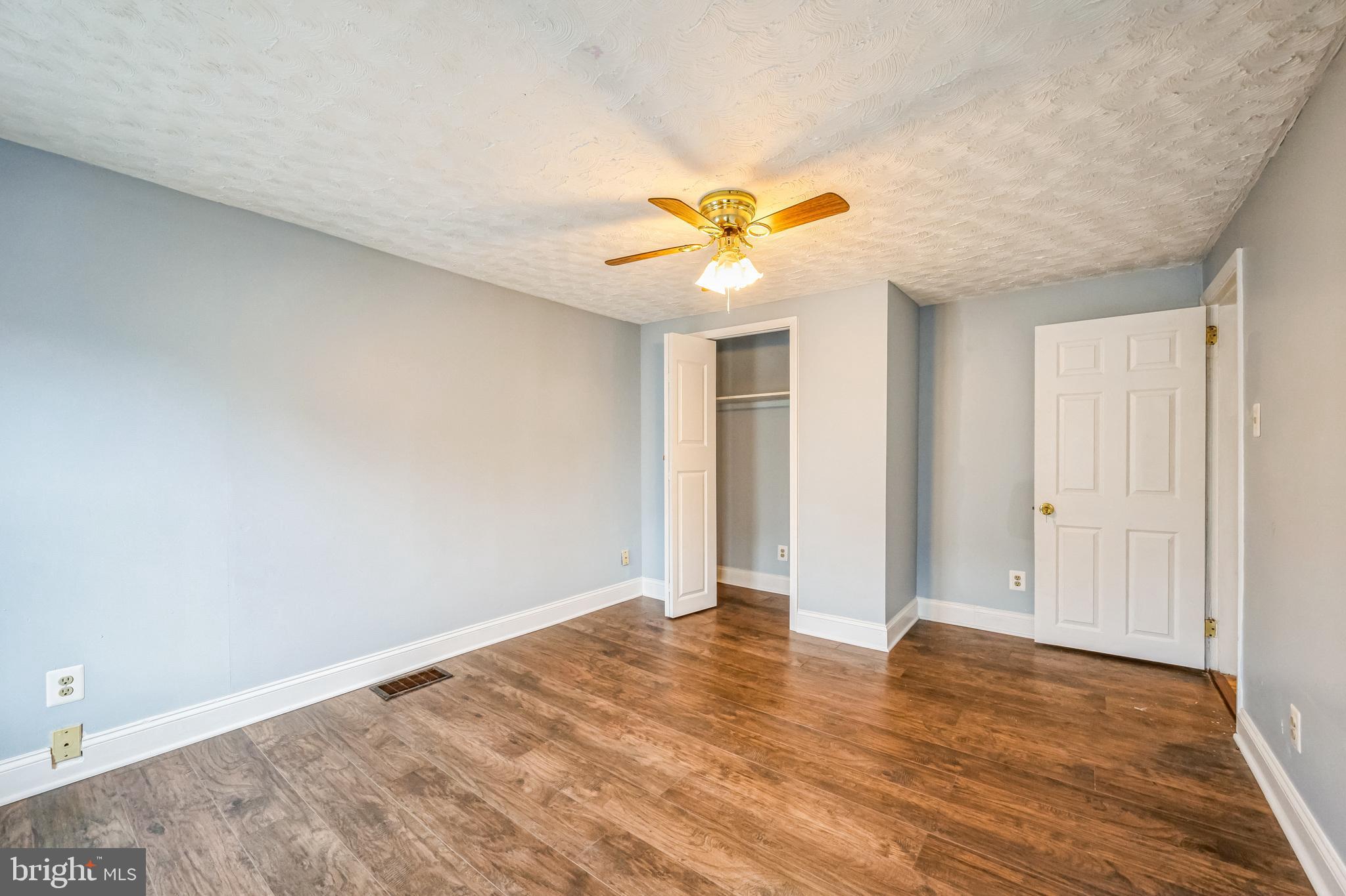 48 Elizabeth Street Hagerstown, MD 21740 - Photo 31 of 48 wooden floor in an empty room