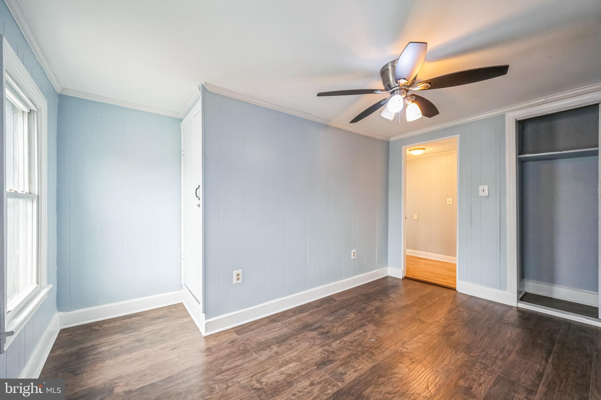 48 Elizabeth Street Hagerstown, MD 21740 - Photo 40 of 48 an empty room with closet and a ceiling fan