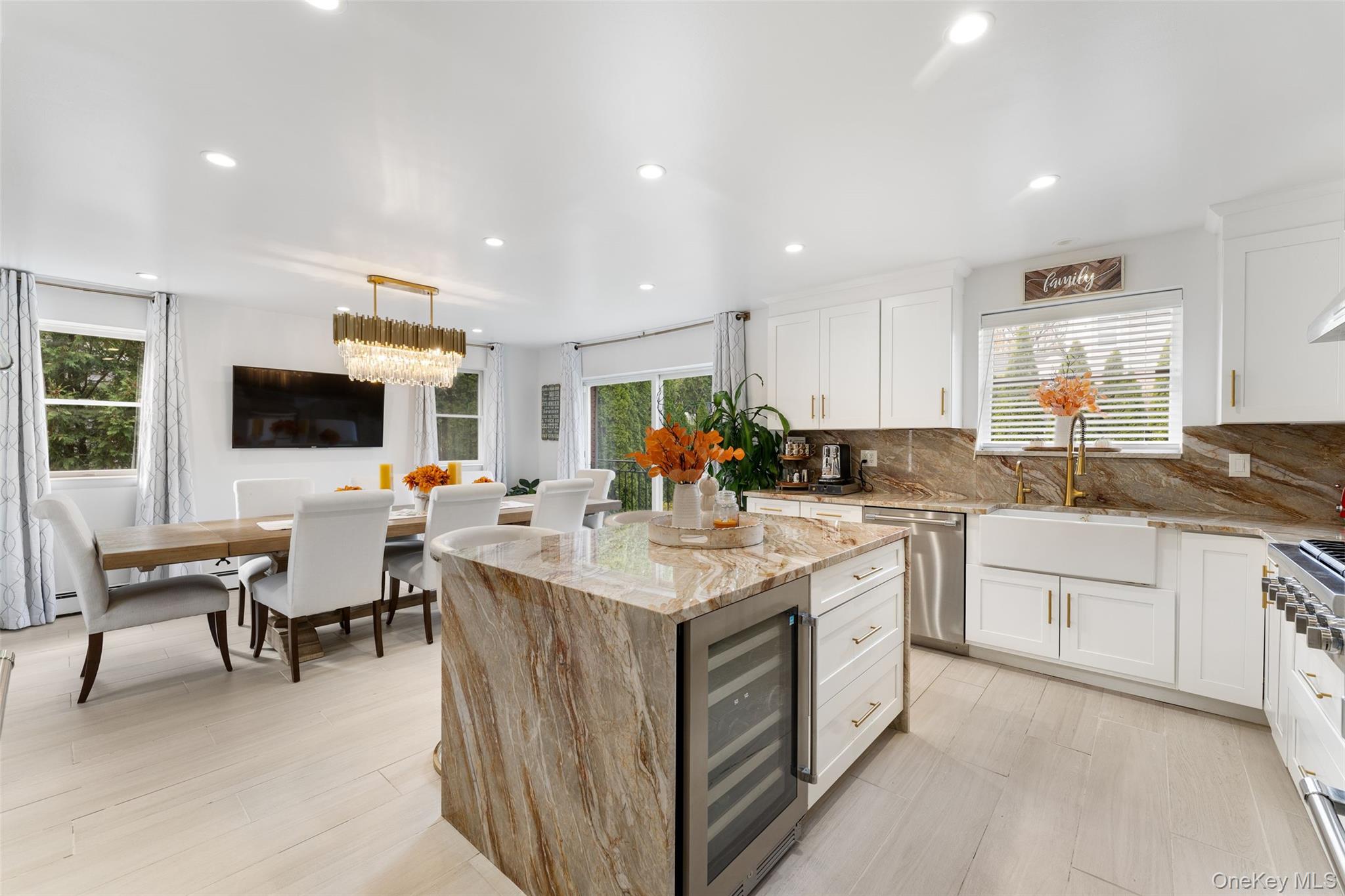 6 Hunting Ridge Road White Plains, NY 10605 - Photo 11 of 32 a kitchen with a sink and white cabinets