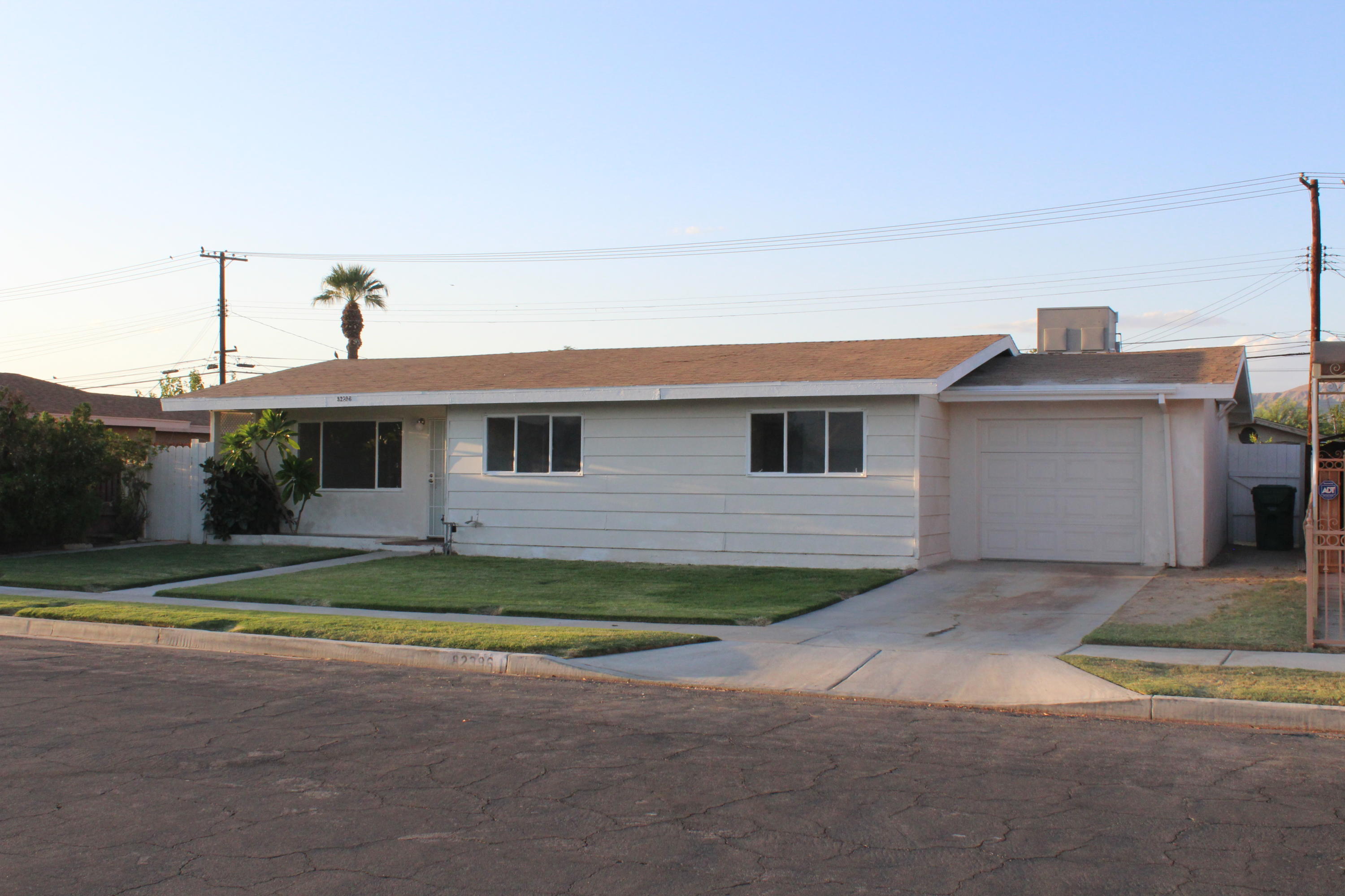 82396 Adobe Road Indio, CA 92201 - Photo 2 of 53 a front view of a house with a yard