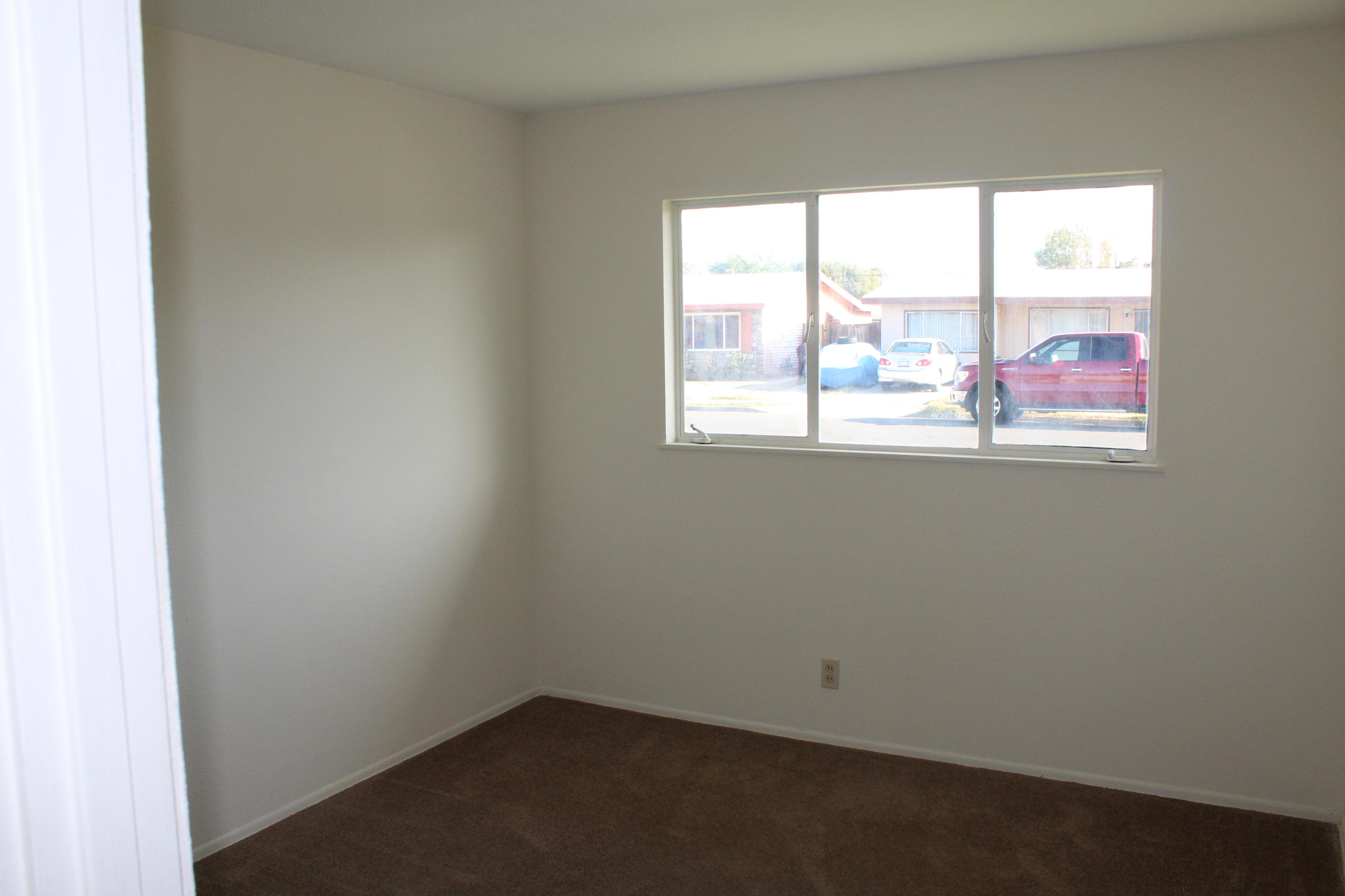 82396 Adobe Road Indio, CA 92201 - Photo 19 of 53 an empty room with a window