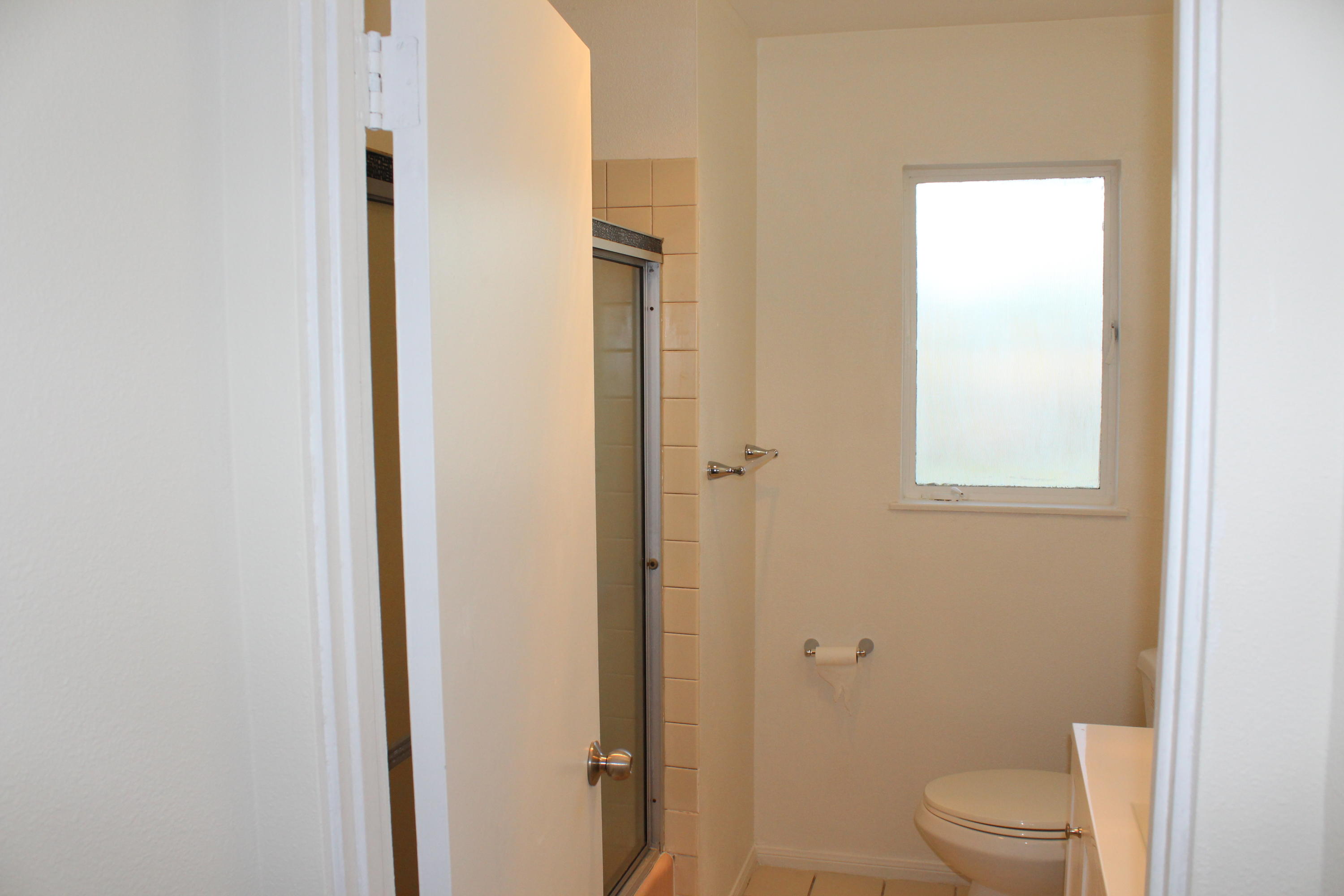 82396 Adobe Road Indio, CA 92201 - Photo 27 of 53 a bathroom with a toilet sink