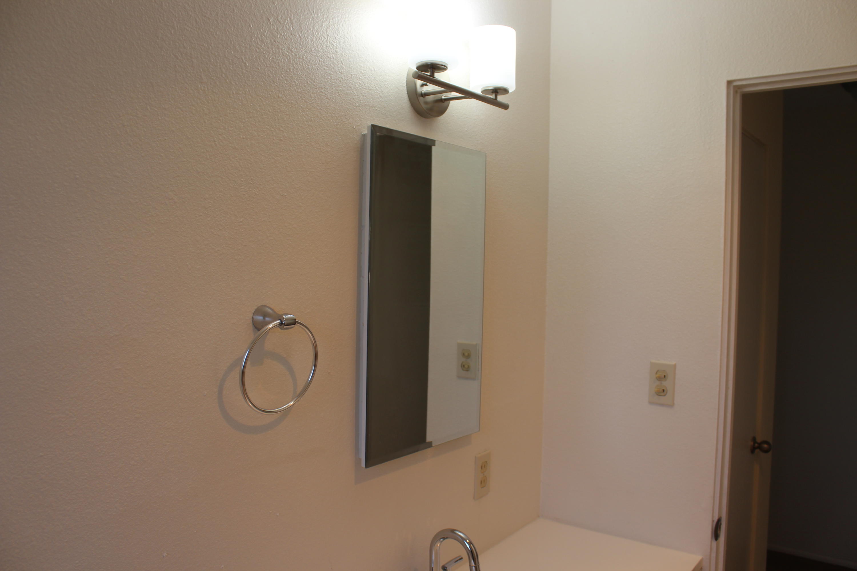 82396 Adobe Road Indio, CA 92201 - Photo 30 of 53 a bathroom with a shower and mirror
