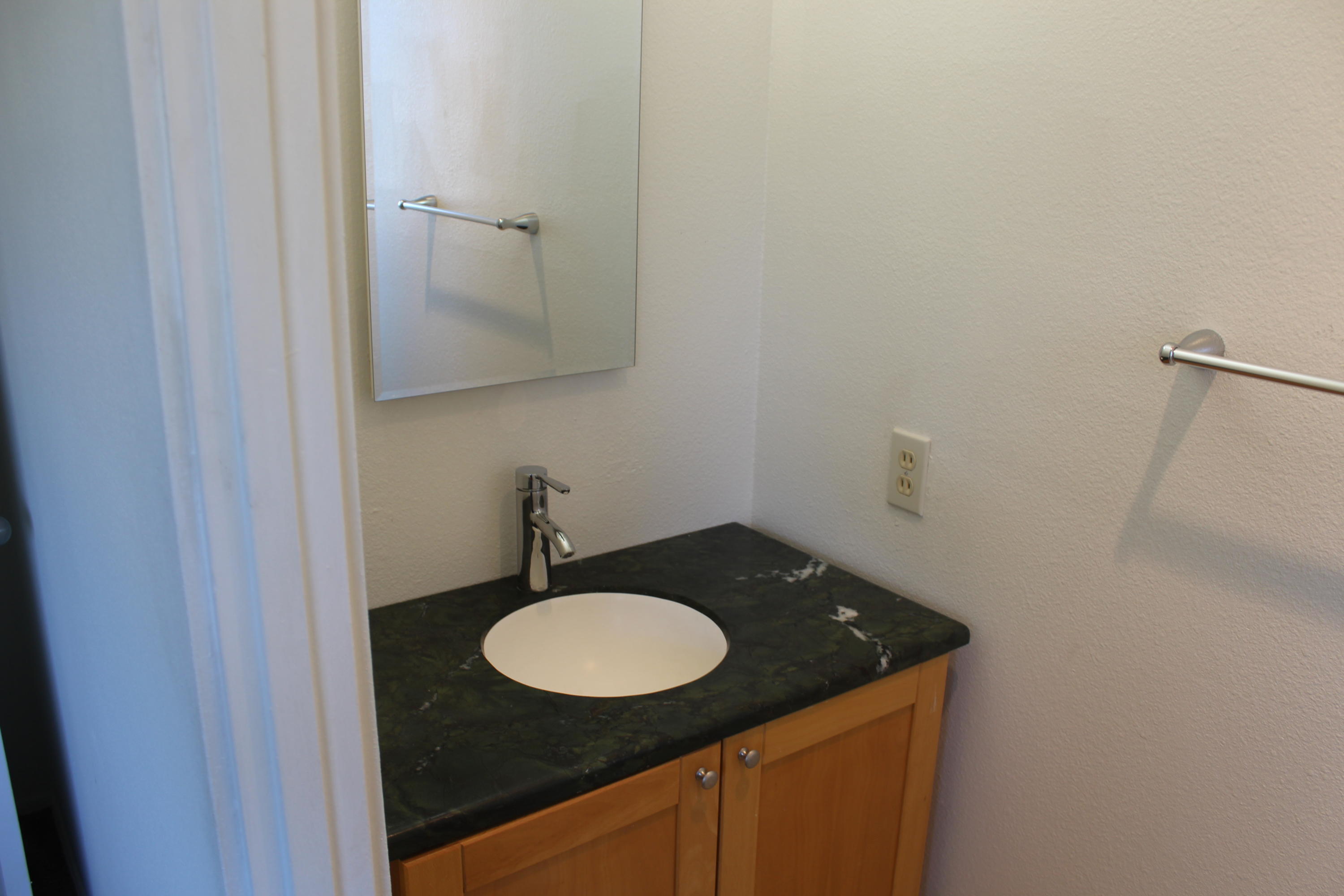 82396 Adobe Road Indio, CA 92201 - Photo 31 of 53 a bathroom with a sink and a mirror