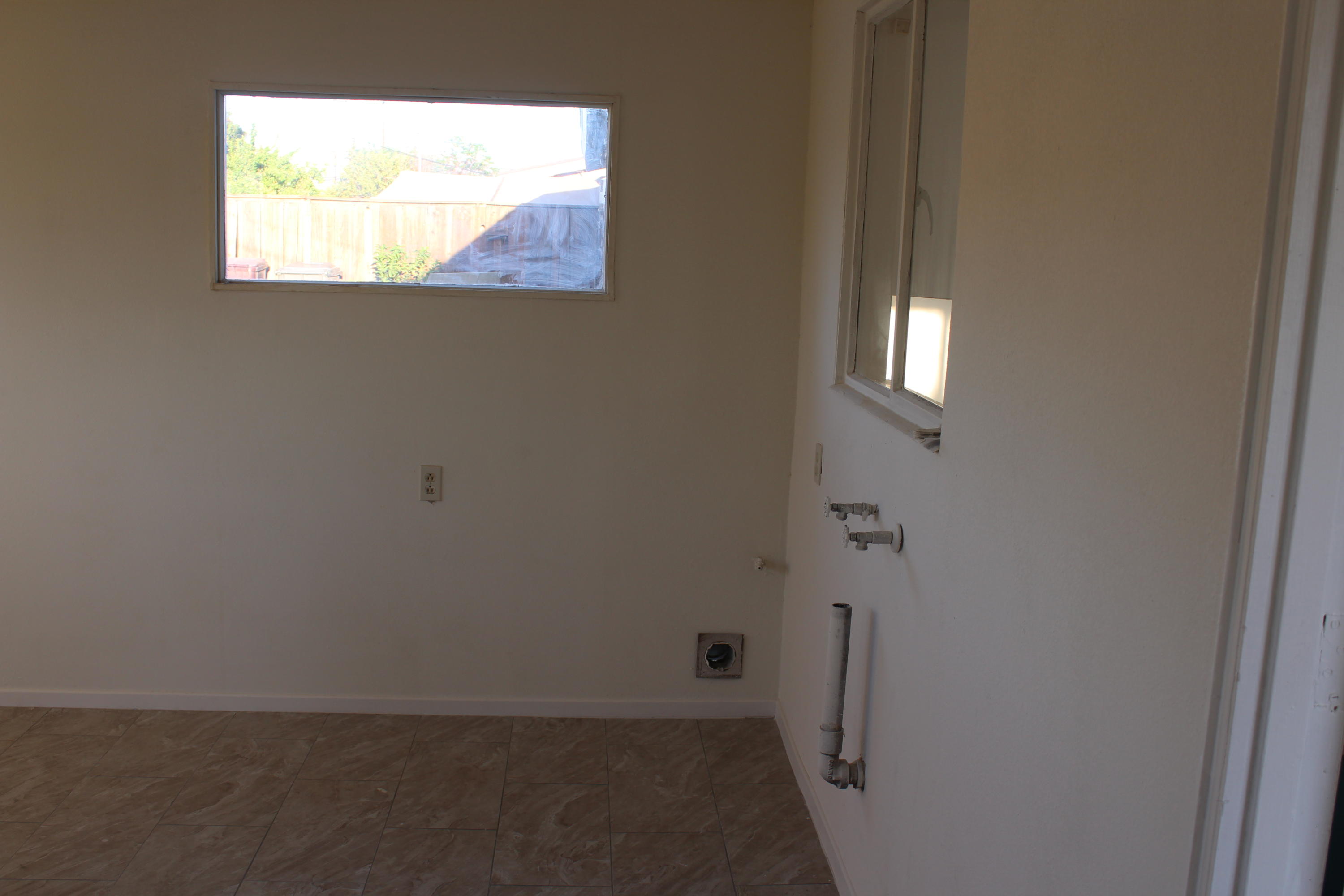 82396 Adobe Road Indio, CA 92201 - Photo 33 of 53 an empty room with a window