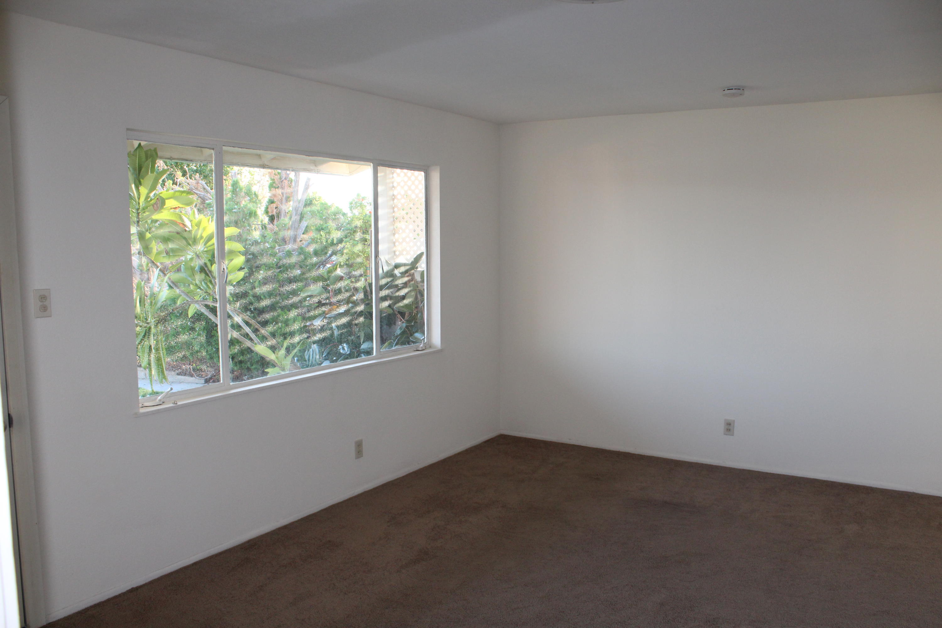 82396 Adobe Road Indio, CA 92201 - Photo 5 of 53 an empty room with a window