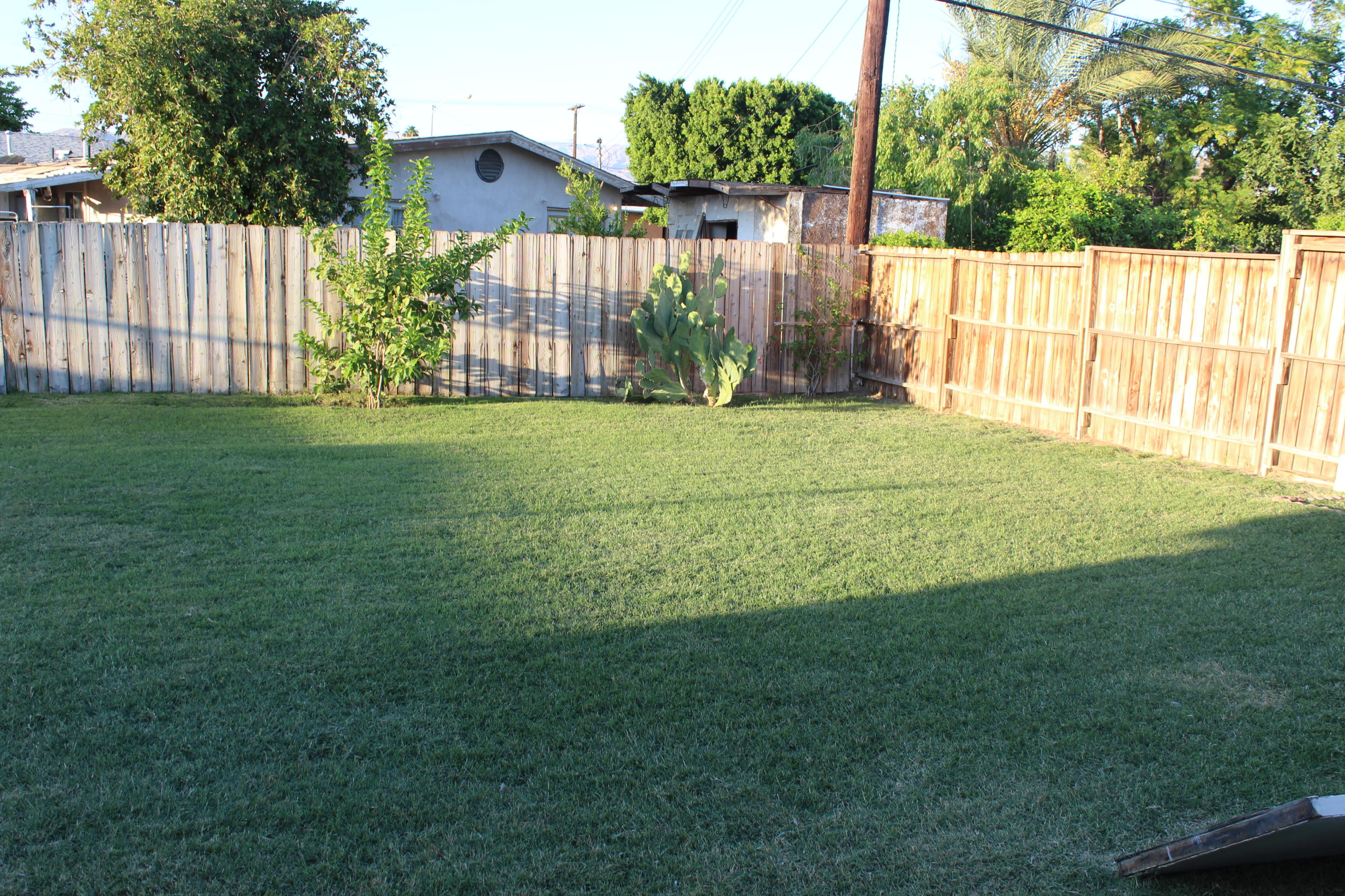 82396 Adobe Road Indio, CA 92201 - Photo 46 of 53 a view of a backyard with wooden fence
