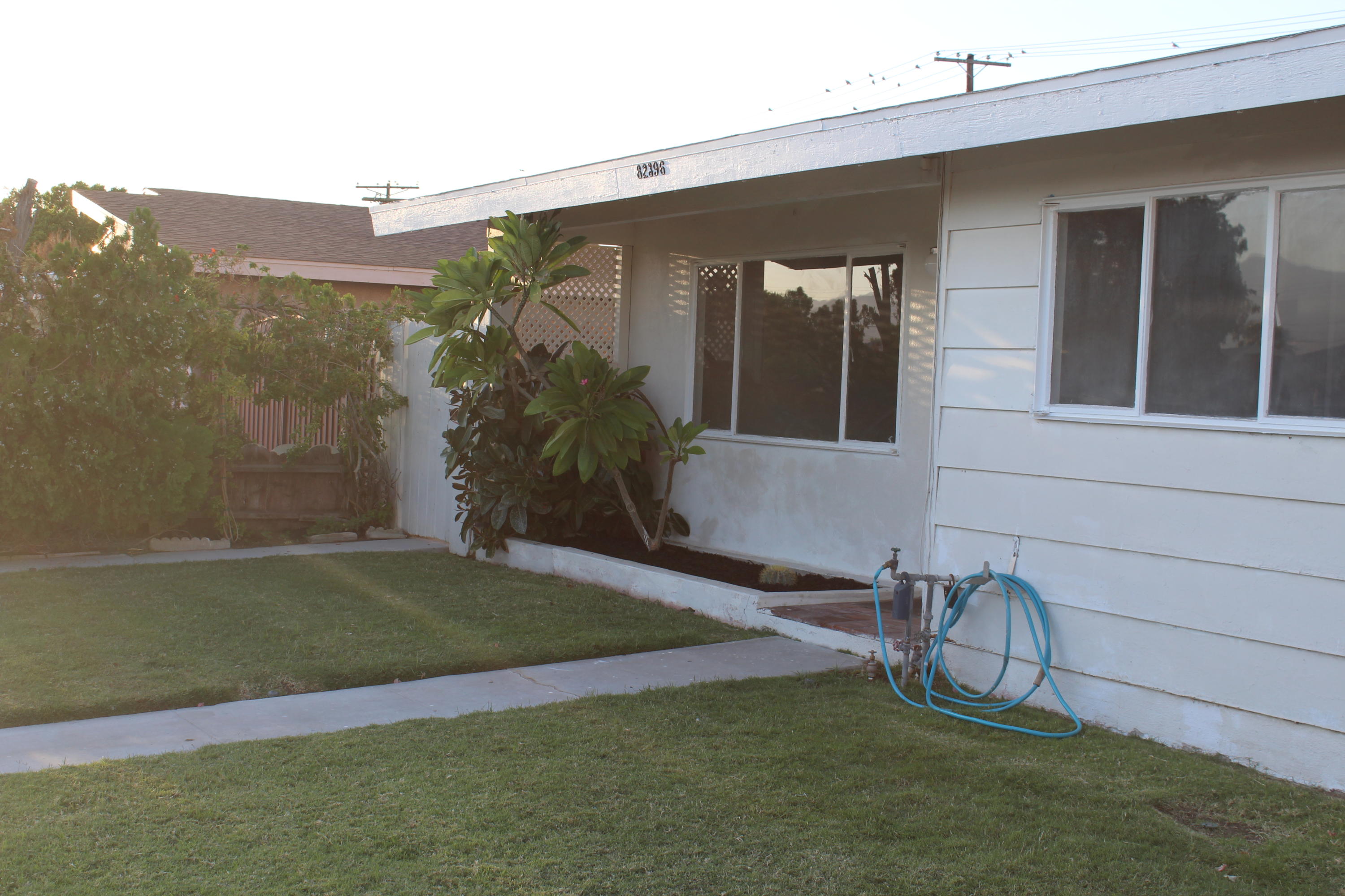 82396 Adobe Road Indio, CA 92201 - Photo 53 of 53 a front view of a house with a yard