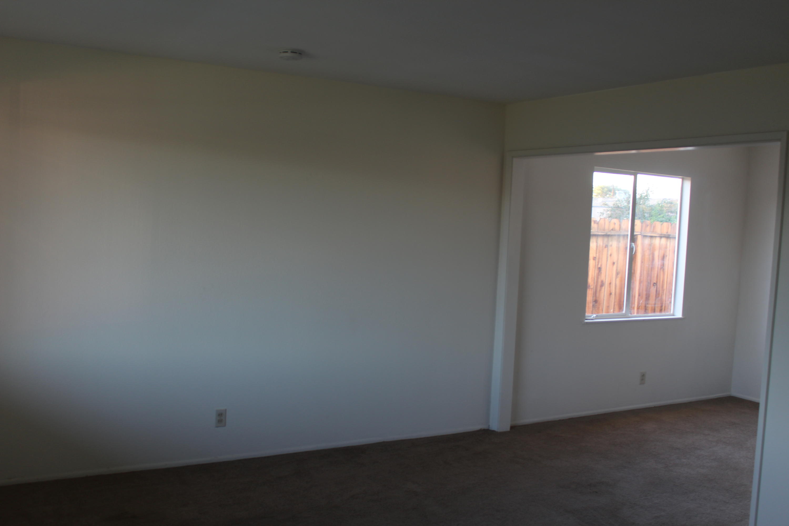 82396 Adobe Road Indio, CA 92201 - Photo 7 of 53 an empty room with a window