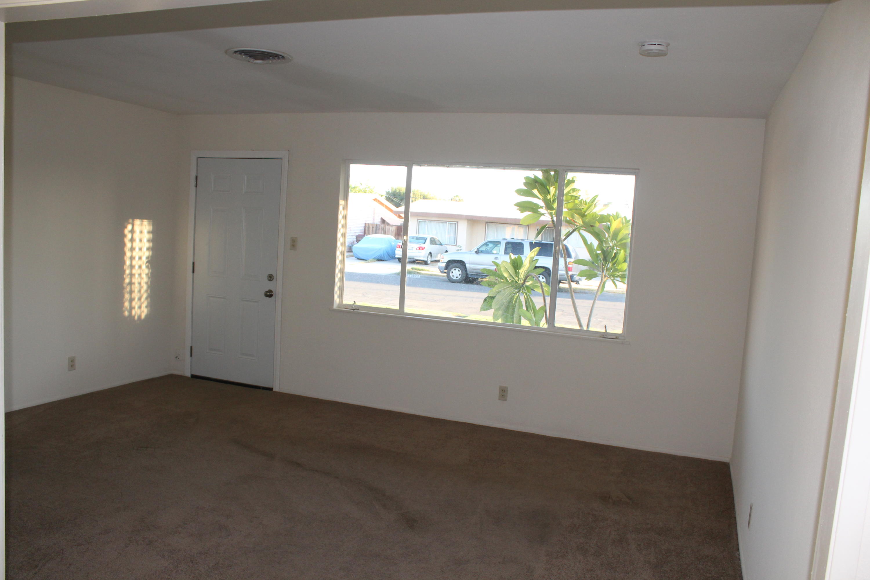 82396 Adobe Road Indio, CA 92201 - Photo 8 of 53 an empty room with a window