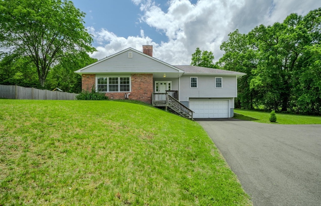 463 Bay Road Amherst, MA 01002 - Photo 1 of 9 a front view of a house with yard