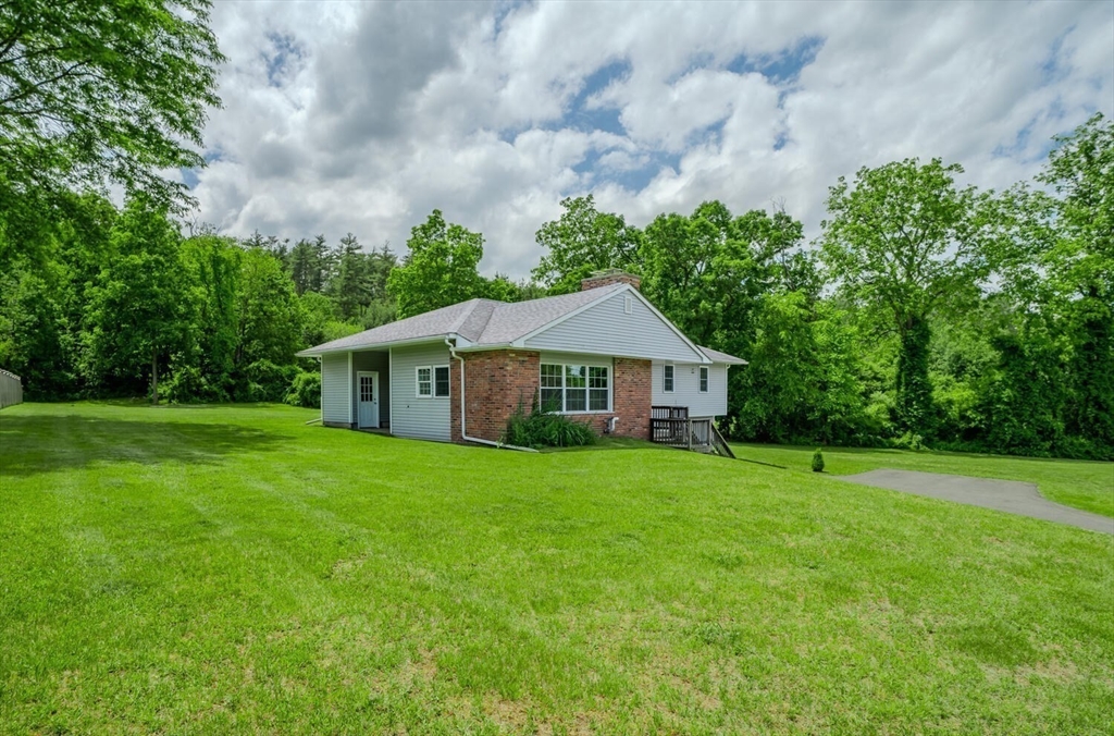 463 Bay Road Amherst, MA 01002 - Photo 7 of 9 a front view of a house with garden