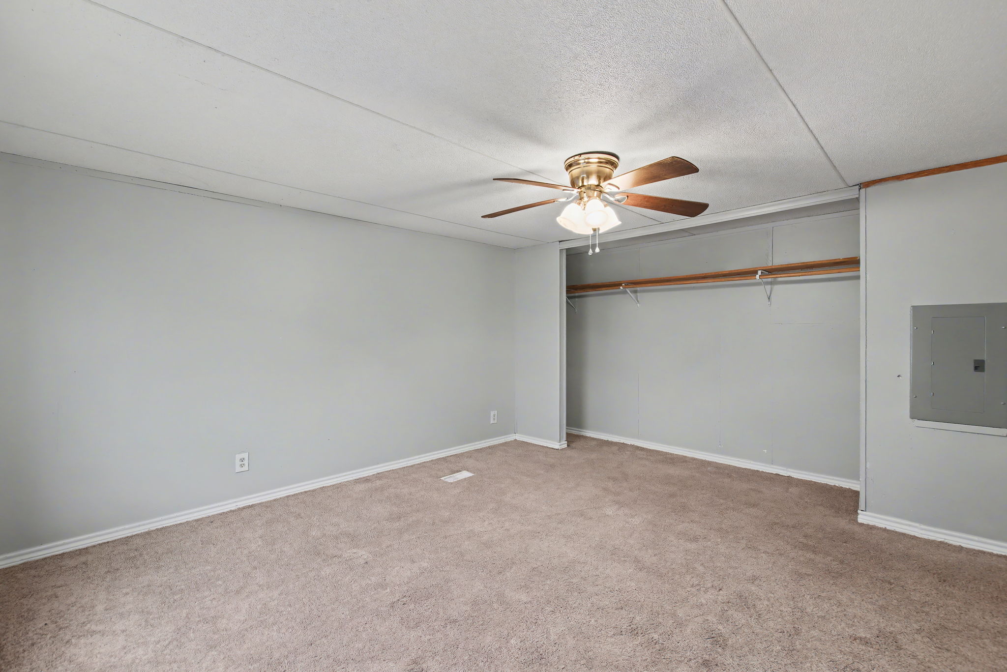 919 Austin Street Kingsland, TX 78639 - Photo 13 of 20 a view of an empty room with a ceiling fan