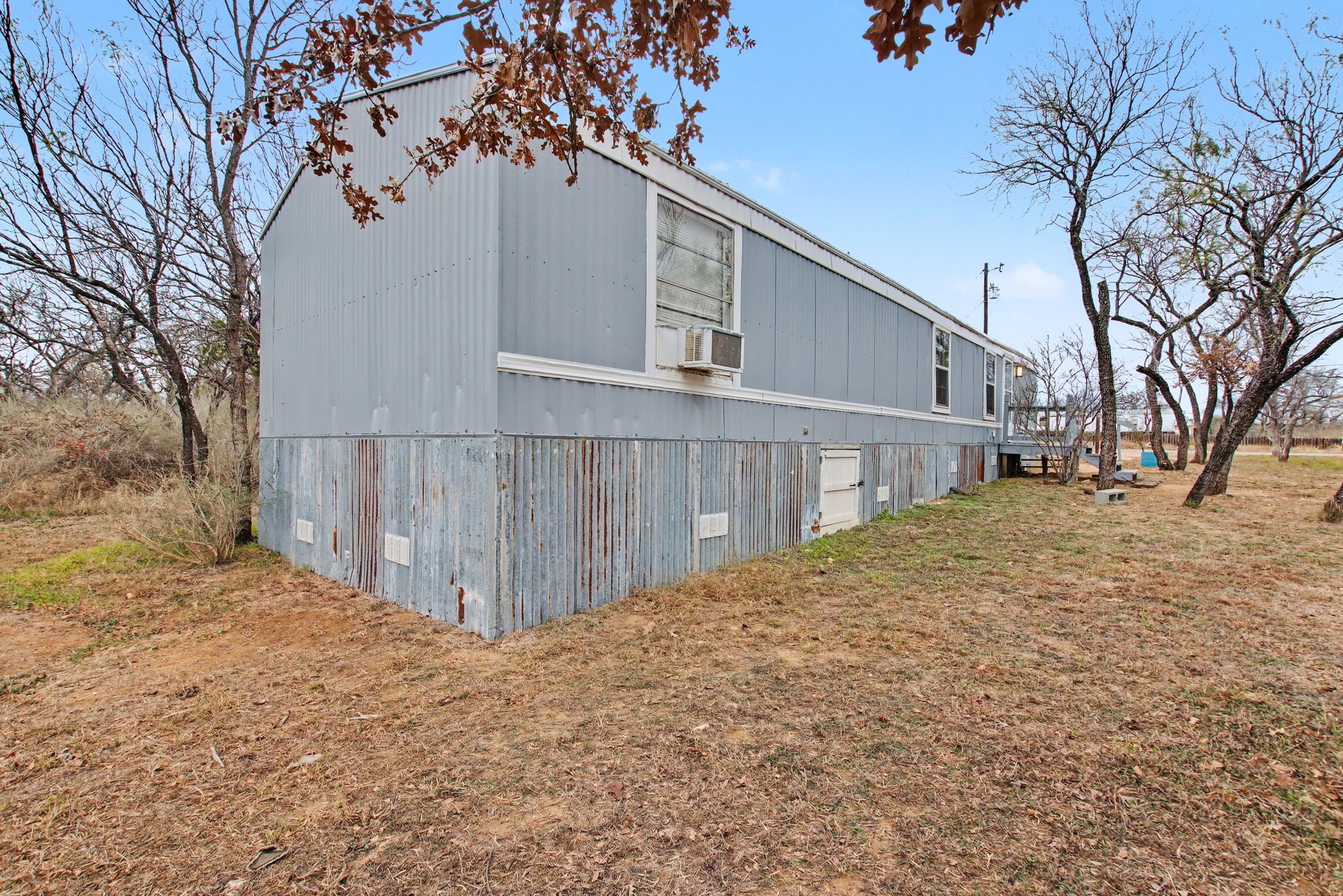 919 Austin Street Kingsland, TX 78639 - Photo 3 of 20 a view of a backyard