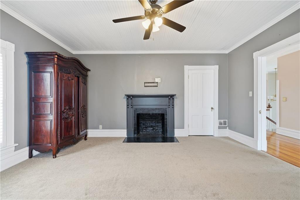 880 Johnstonville Road Barnesville, GA 30204 - Photo 24 of 33 a view of a livingroom with an empty space and a fireplace