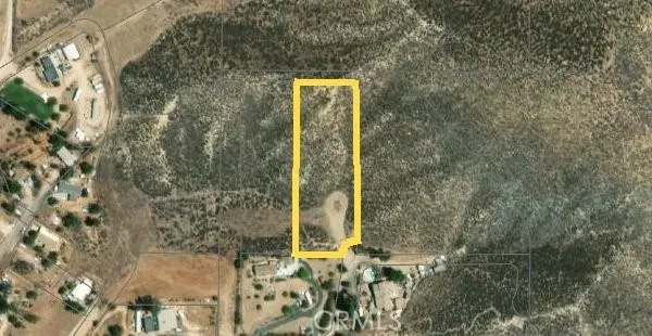 a view of beach and mountains
