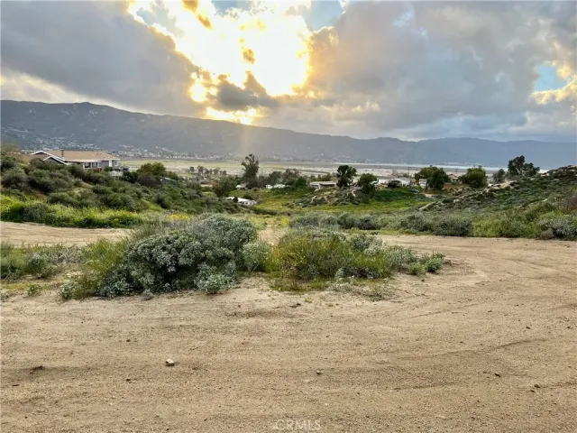 a view of a yard next to a building