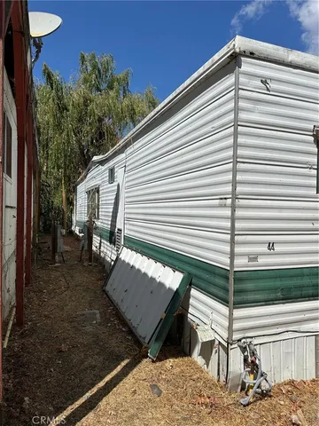 a view of a backyard with a patio