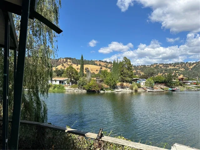 a view of a lake with a house