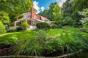 131 Old Stone Hill Road Pound Ridge, NY 10576 - Photo 1 of 1 a view of a house with a yard