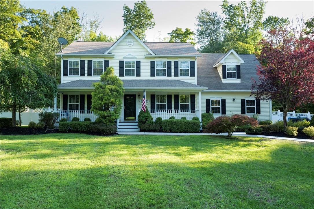 894 Laroe Road Monroe, NY 10950 - Photo 1 of 1 a front view of a house with a garden