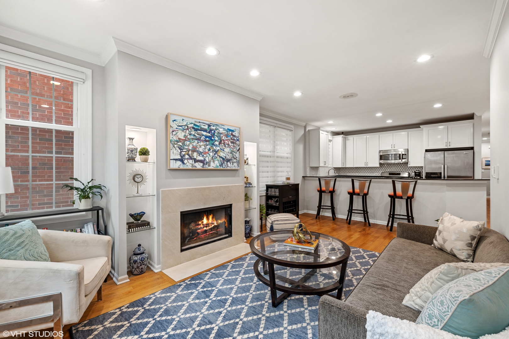2050 North Racine Avenue, Unit 1 Chicago, IL 60614 - Photo 2 of 25 a living room with furniture and a fireplace