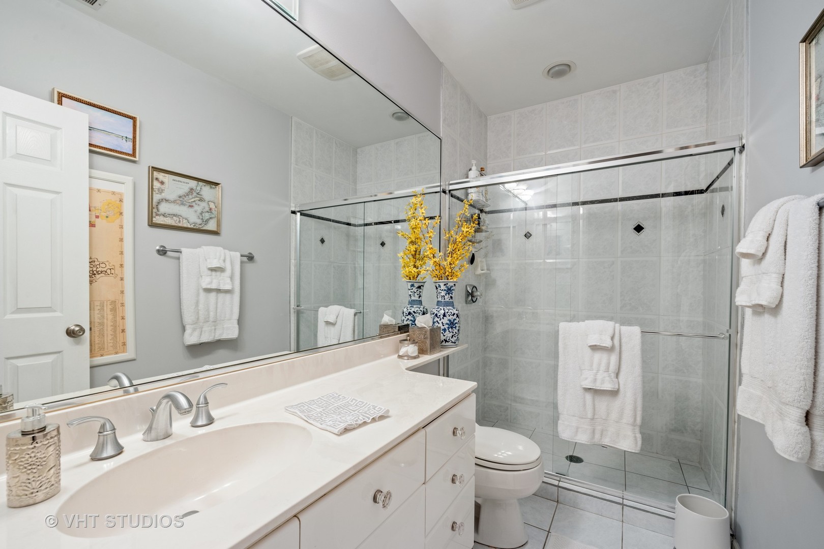 2050 North Racine Avenue, Unit 1 Chicago, IL 60614 - Photo 18 of 25 a bathroom with a sink toilet and shower