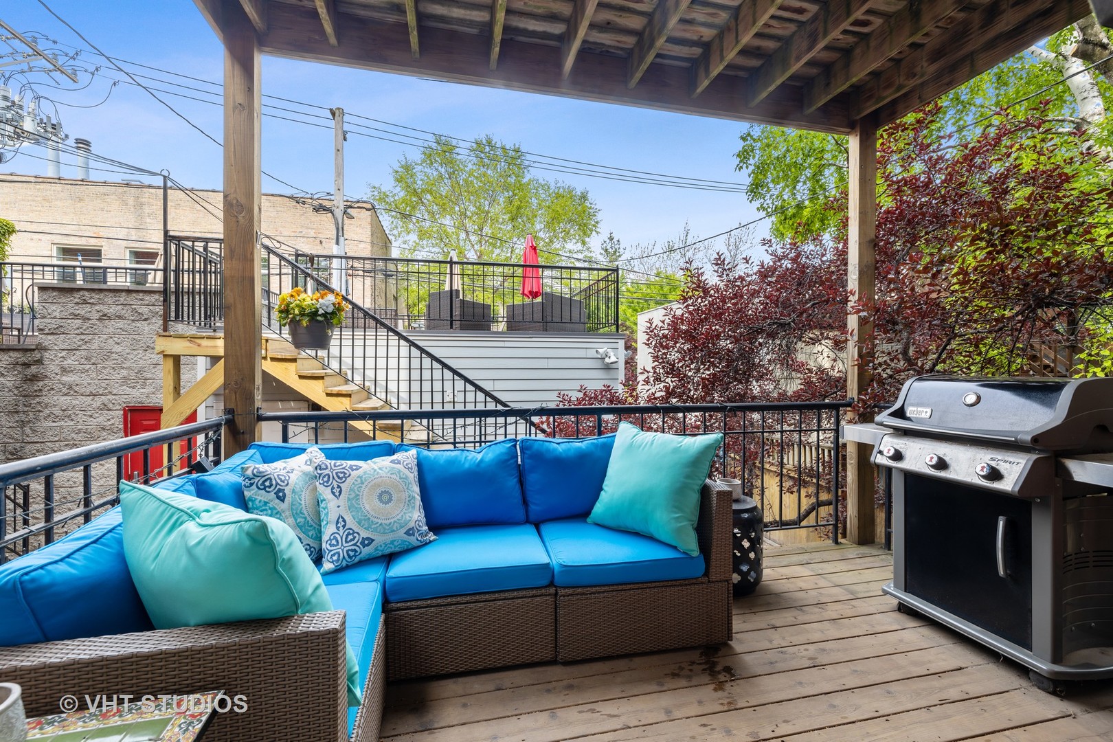 2050 North Racine Avenue, Unit 1 Chicago, IL 60614 - Photo 19 of 25 a balcony with furniture and a potted plant