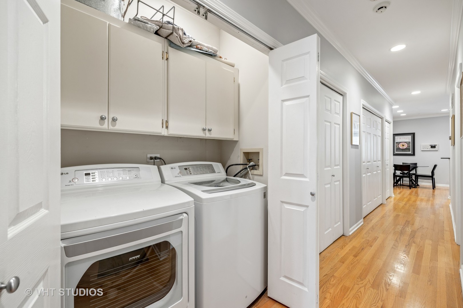 2050 North Racine Avenue, Unit 1 Chicago, IL 60614 - Photo 22 of 25 a view of a storage and utility room with washer and dryer