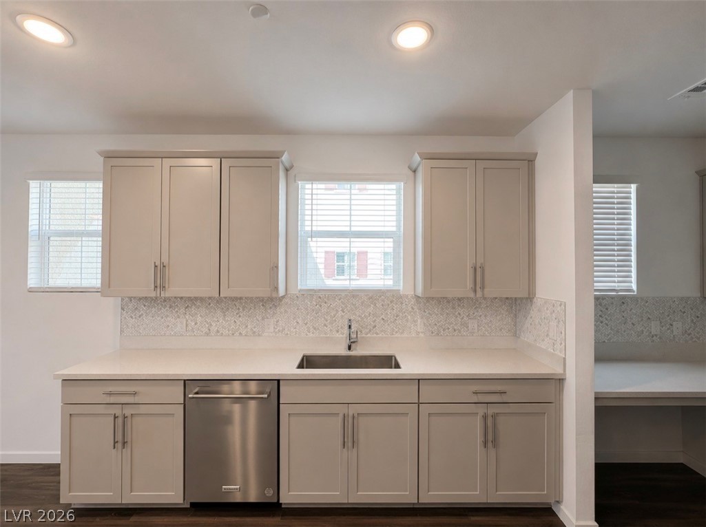 2555 Hampton Road, Unit 4205 Henderson, NV 89052 - Photo 15 of 52 This modern kitchen features elegant countertops and sleek cabinetry, perfect for culinary endeavors.