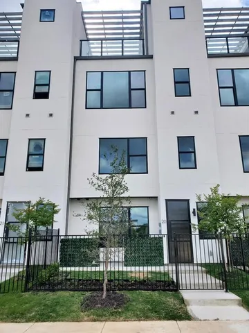 a white table and chairs in a kitchen