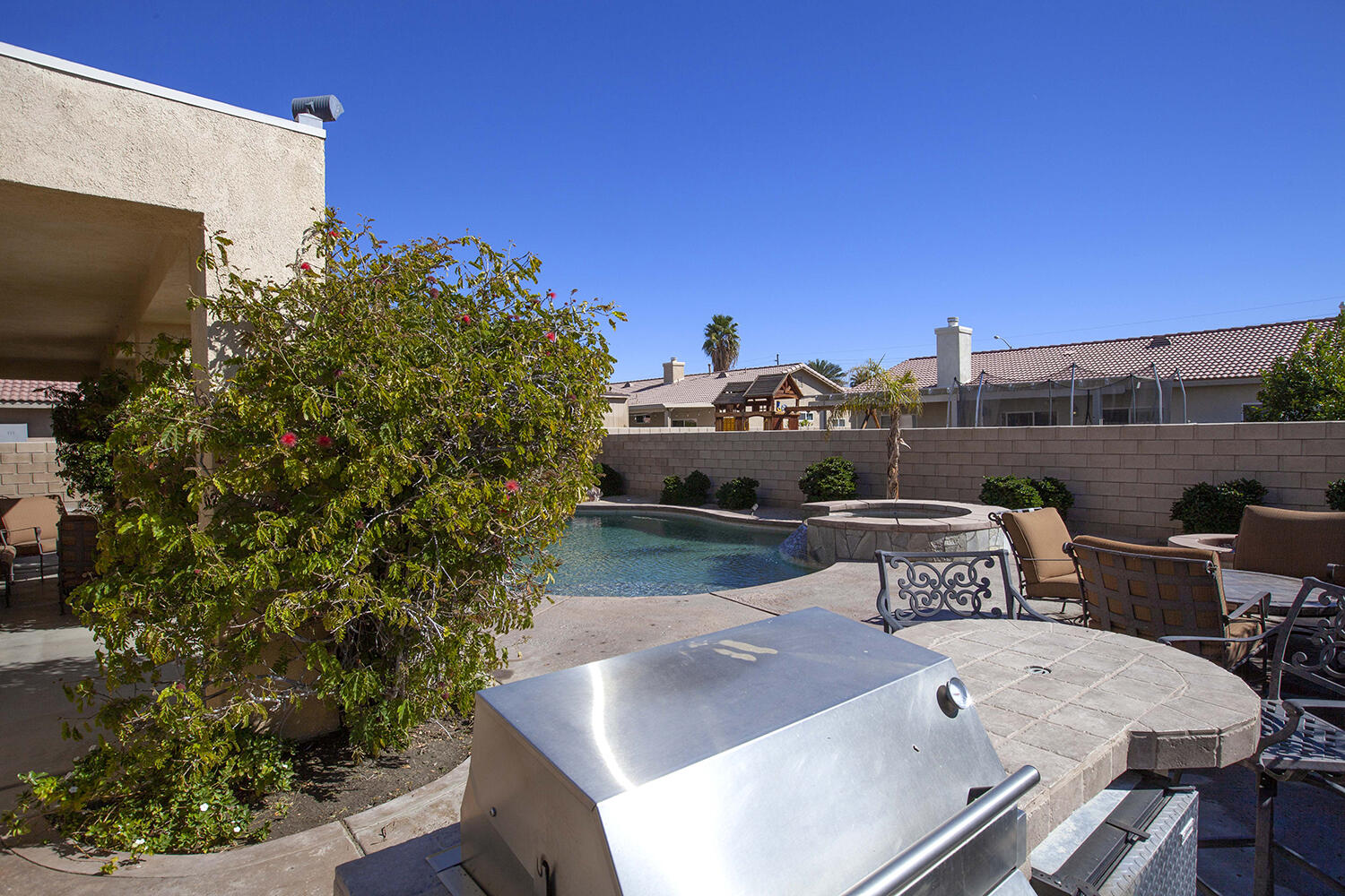 43500 Brahea Court Indio, CA 92201 - Photo 5 of 33 a terrace with outdoor seating and city view