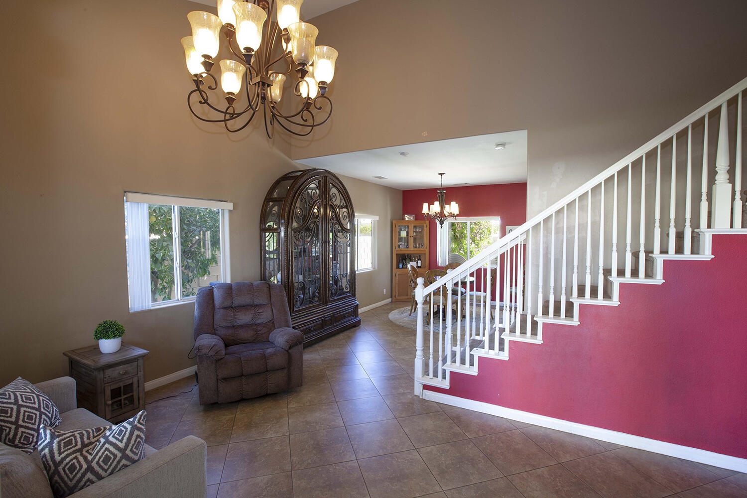 43500 Brahea Court Indio, CA 92201 - Photo 8 of 33 a living room with fireplace furniture and a large window