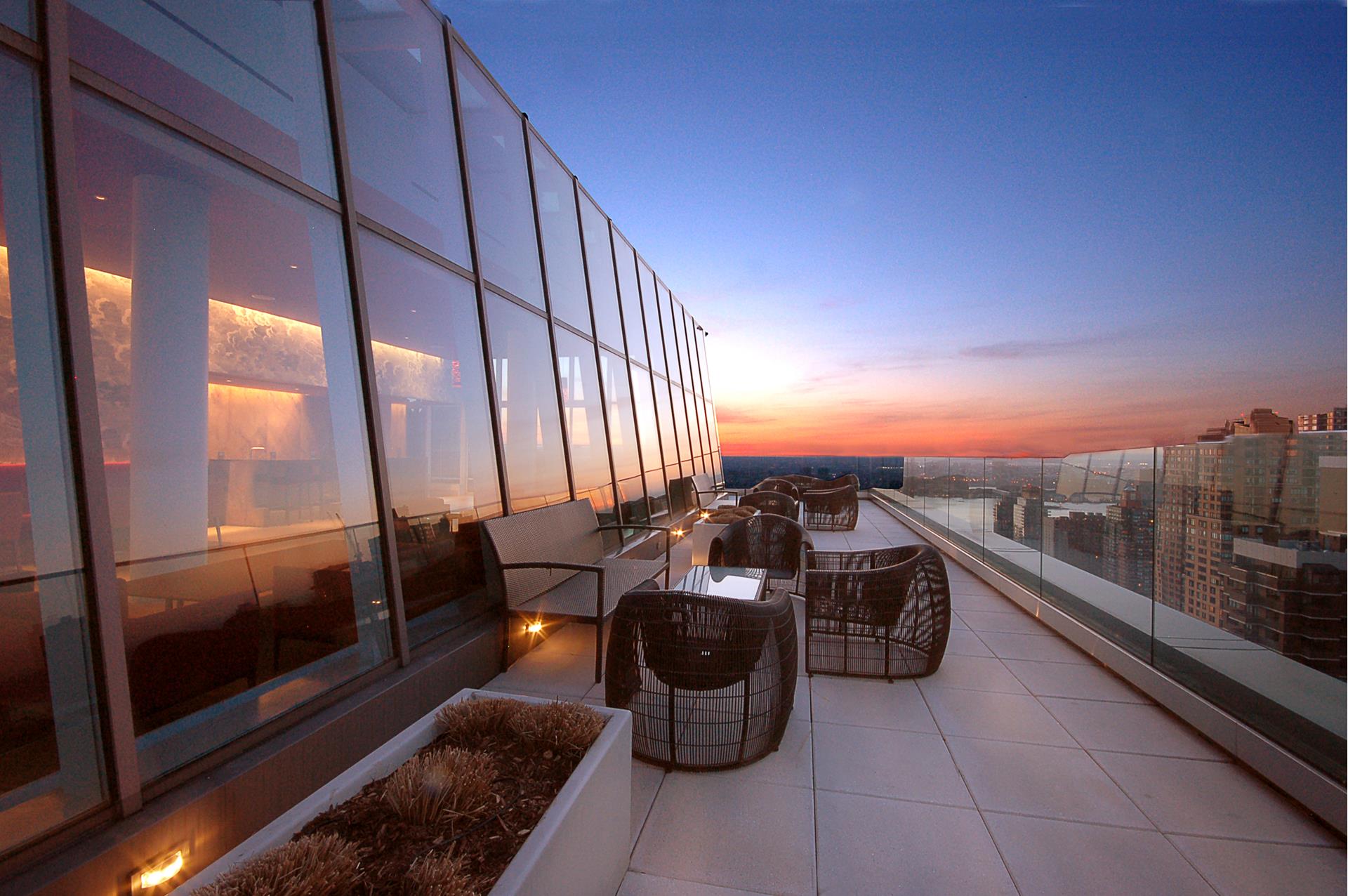 322 West 57th Street, Unit 55S1 Manhattan, NY 10019 - Photo 26 of 33 a view of a terrace with sky view
