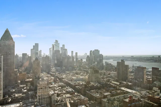 a view of a room with a sink and cabinet