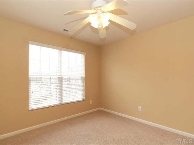 7122 Racine Way Raleigh, NC 27615 - Photo 14 of 20 The two secondary bedrooms are each a nice size with plenty of closet space.